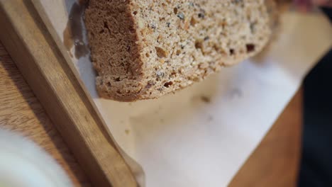 slice of cake on wooden tray