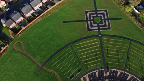 modern circular cemetery pathway design aerial view artistic garden of rest flying above pattern