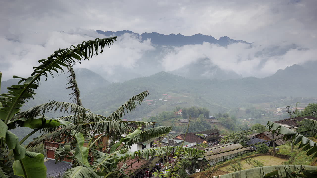 A serene timelapse of Sapa’s breathtaking mountain scenery in northern Vietnam, as clouds drift across the lush peaks and valleys.