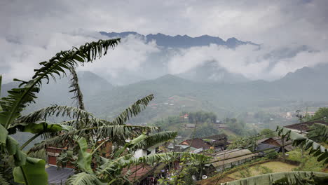 a serene timelapse of sapa’s breathtaking mountain scenery in northern vietnam, as clouds drift across the lush peaks and valleys.