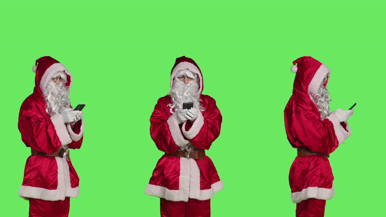 Santa Claus using phone on green screen