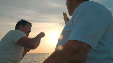 Father-and-Son-Practicing-Punch-in-Joke