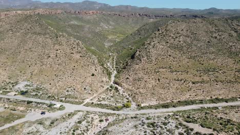 flying-away-from-a-big-crater-while-looking-at-the-entrance