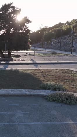 empty driving school parking lot at sunrise