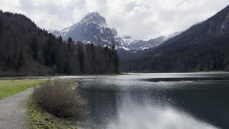 Small-path-near-The-Obersee-in-the-Glarus-Alps-area,-Glarnerland,-Näfels,-Switzerland