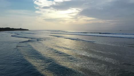 G-Land-beach-in-east-Java-Indonesia-sunset-afternoon,-Aerial-low-altitude-shot