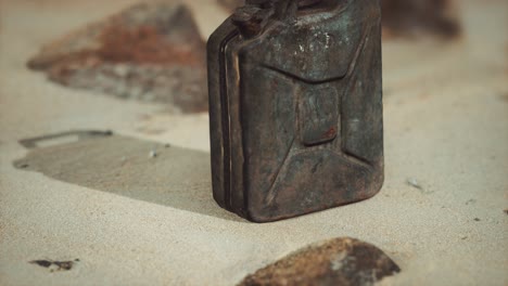 old rusty fuel canister in the desert