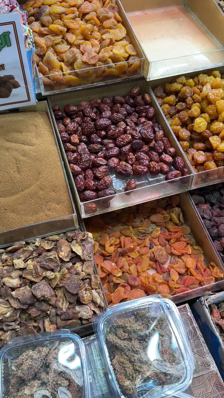 Tehran Iran nut dry fruit pistachios market almonds cashews food assortment bulk containers diet display healthy food snacks nutrition plant-based protein retail shelf shopping variety vegan wellness