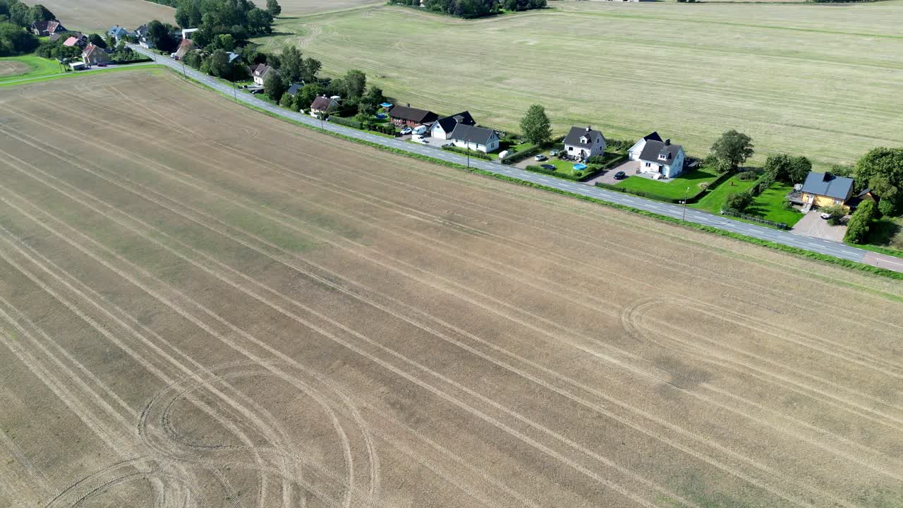 Houses and fields in H&auml;sslunda near M&ouml;rarp in Sk&aring;ne, Sweden