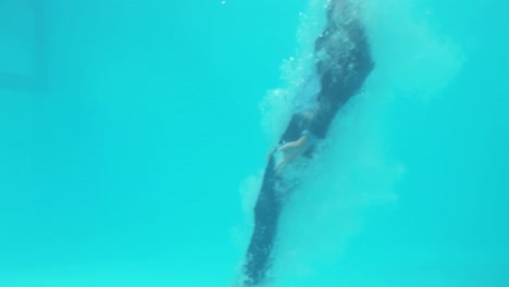 smiling businessman swimming