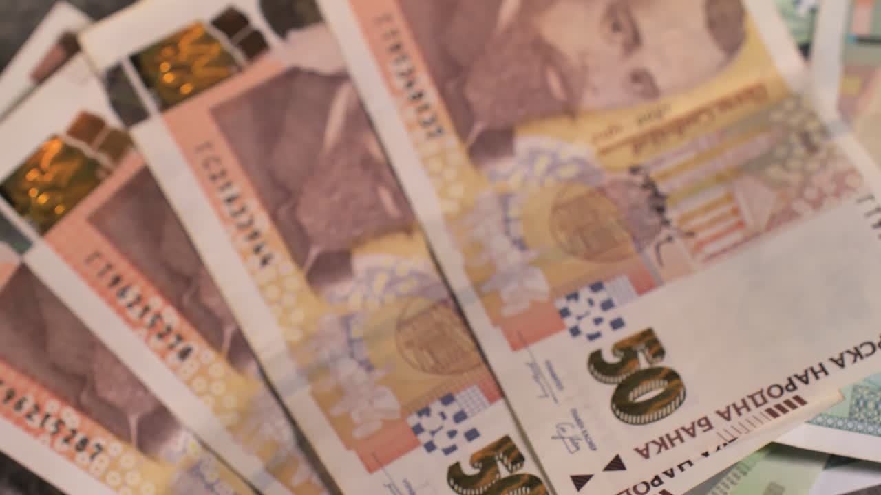 Bulgaria change currency, Bulgaria Lev to Euro. Money exchange. Paper banknotes on table. Concept, economy, competition, crisis, banking and finance. BGN,BGL. Scene R. Close up slide shot