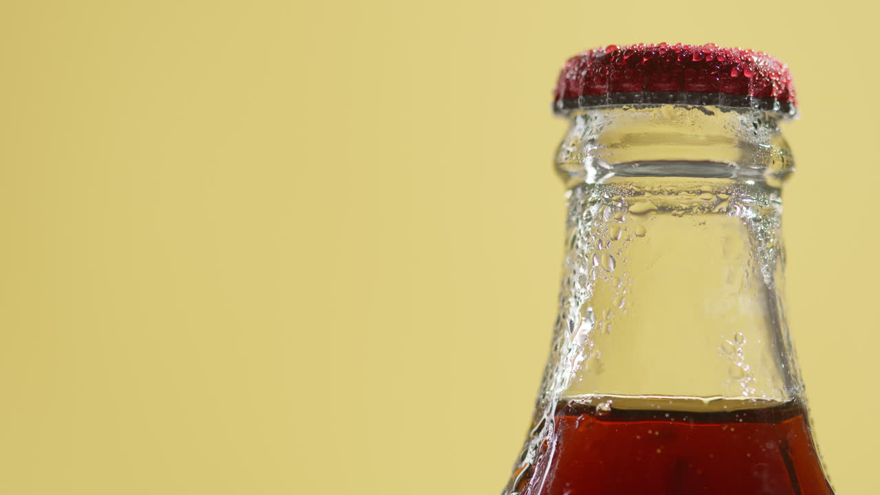 Close Up Of Condensation Droplets On Neck Of Bottle Of Cold Beer Or Soft Drink With Metal Cap 1