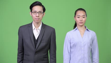 young asian business couple together