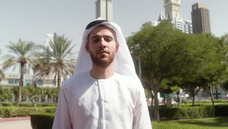 man with arabic clothing in the street