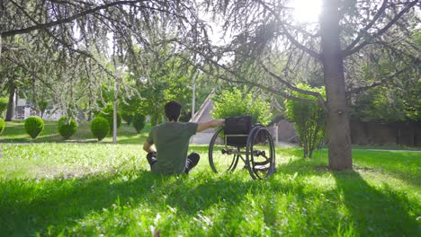 disabled young man and his wheelchair. joy of life.