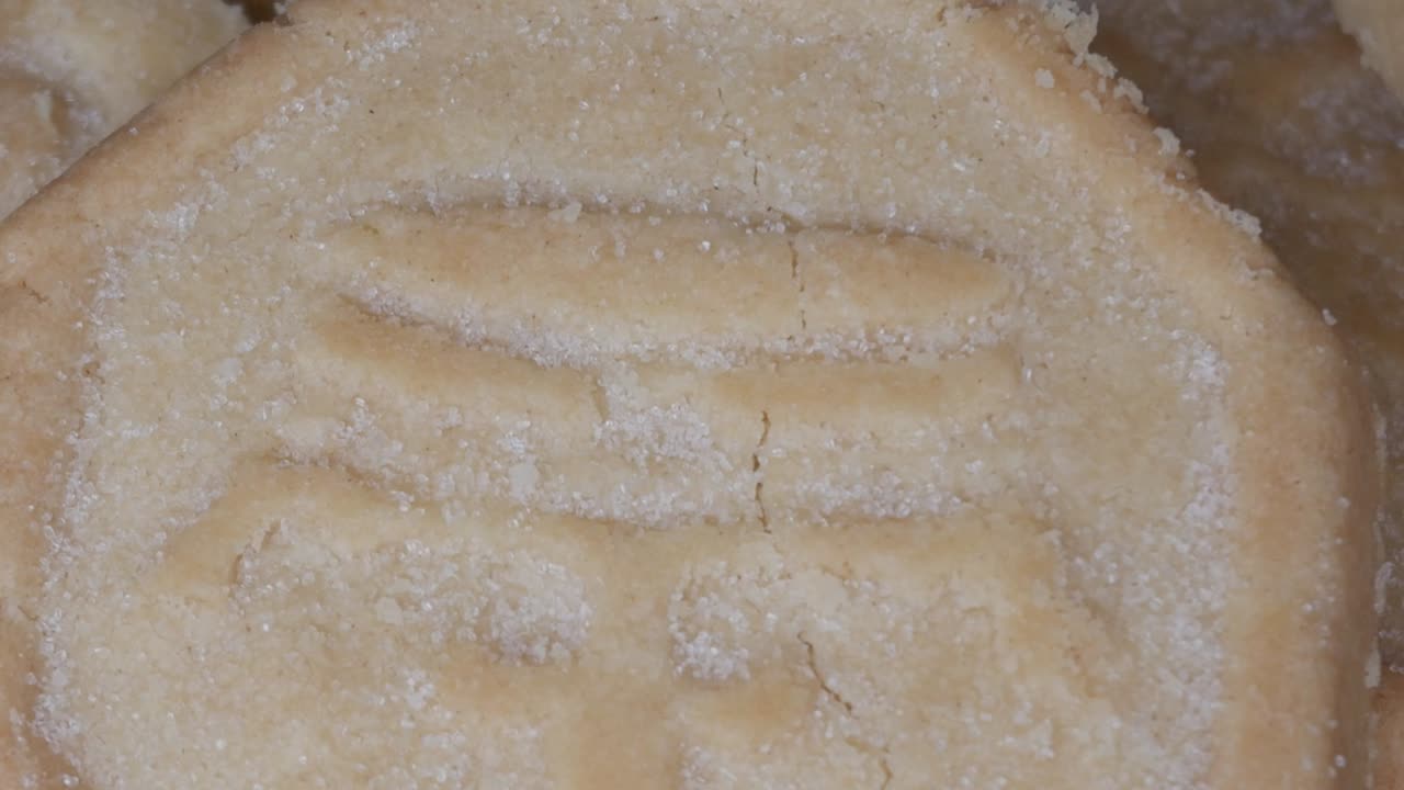 Close-up of sugar-topped shortbread evokes a cozy, sweet feeling