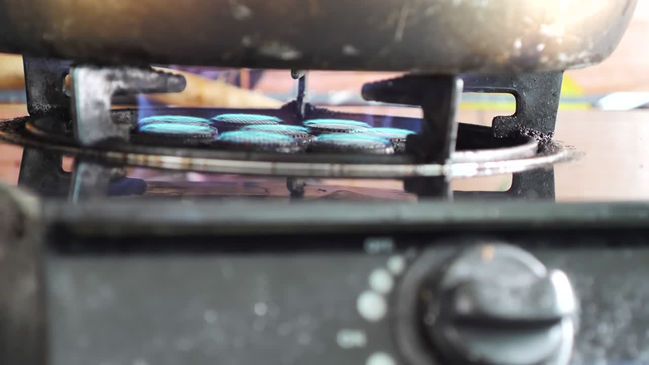 the gas-burning from the gas stove in the kitchen