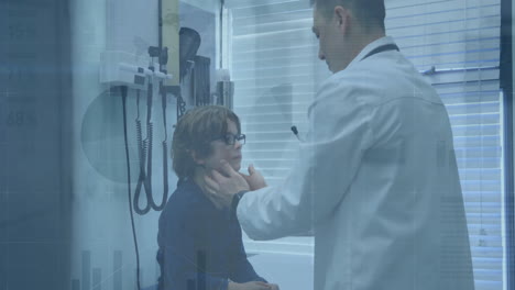 animation of financial data processing over caucasian male doctor with boy patient