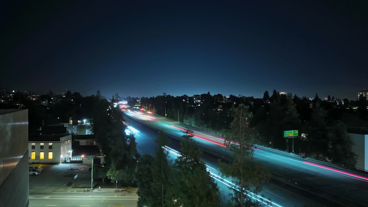 A vivid look at Oakland’s evening rush unfolds along I-580, with a time-lapse panning shot emphasizing the steady pulse of cars into the city’s nighttime skyline