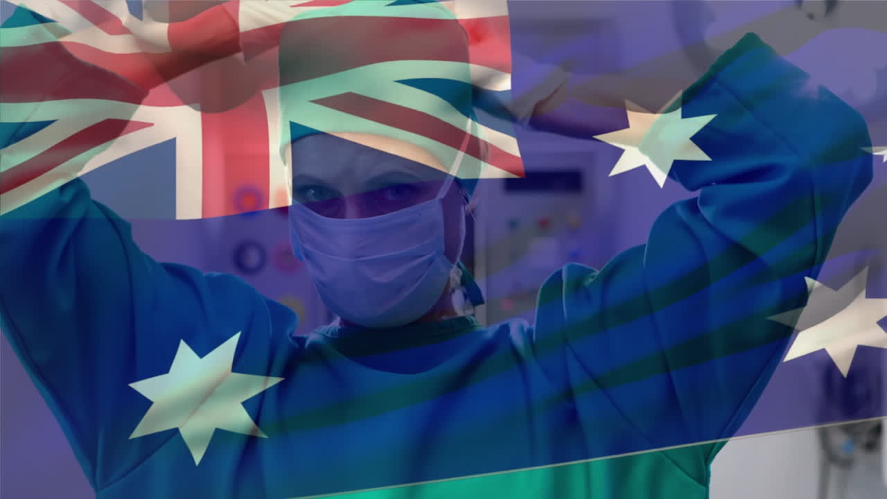 병원에서 얼굴 마스크를 쓰고 있는 여성 외과 의사를 상대로 호주 국기가 흔들리는 디지털 구성