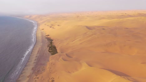 good high aerial shot over the vast sand dunes of the namib desert along the skeleton coast of namibia