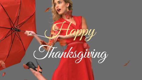 Happy-Thanksgiving-text-animation-over-woman-in-red-dress-holding-red-umbrella