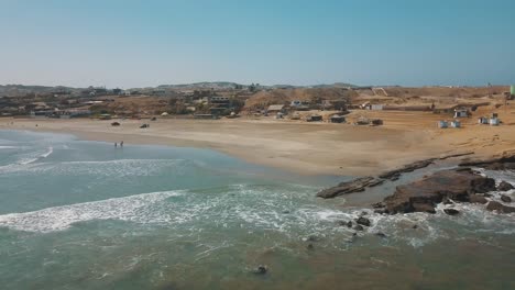 A-beautiful-sunny-day-at-the-beach-in-Peru,-South-America---Drone-aerial-View