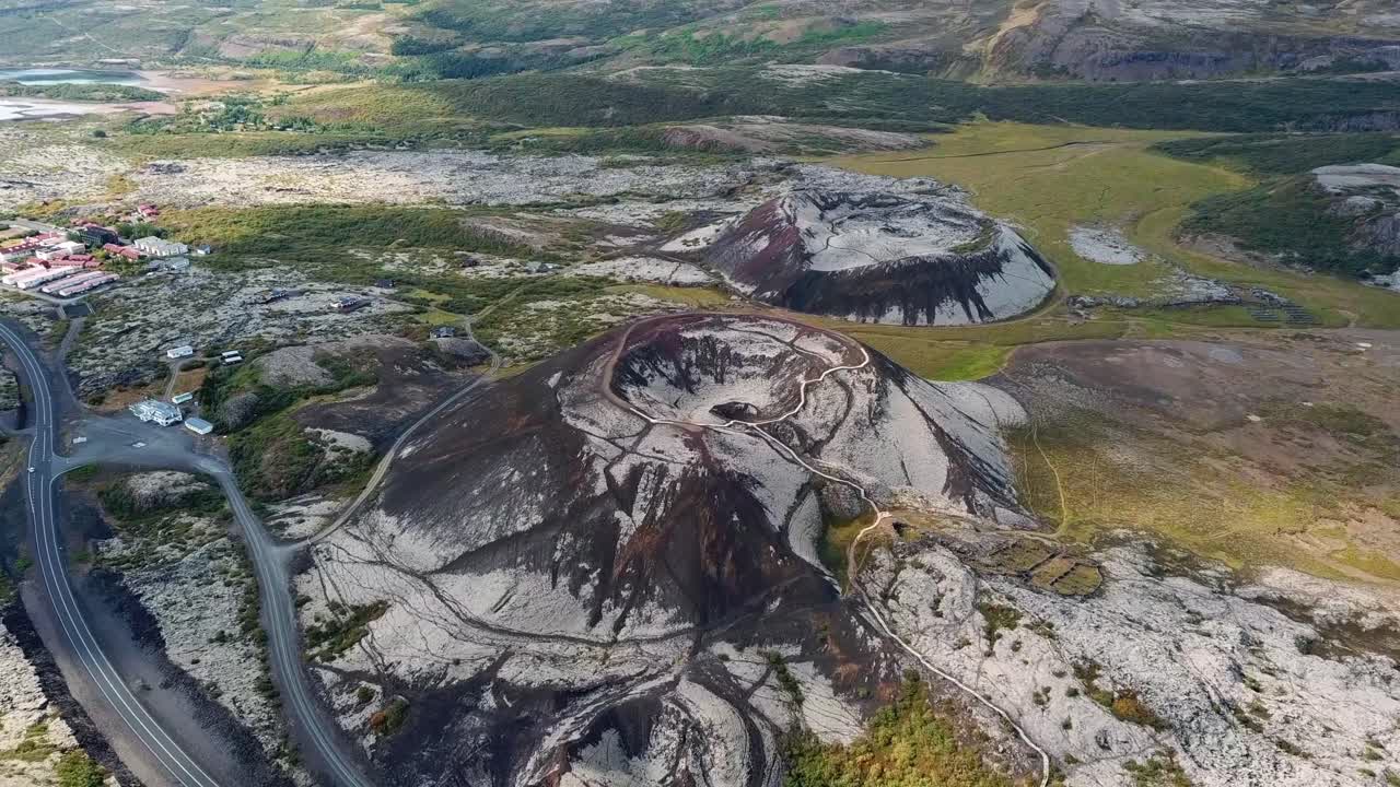Aerial view of Grabrok crater, a prominent volcanic landmark in Iceland, showcasing its distinct geological features and surrounding natural beauty, Iceland