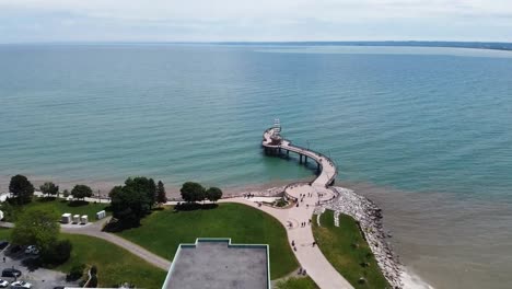 drone flying towards burlington pier on a sunny summer day