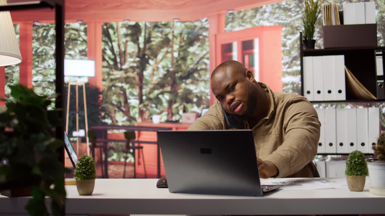 Financial consultant answering a phone call from a stakeholder at home