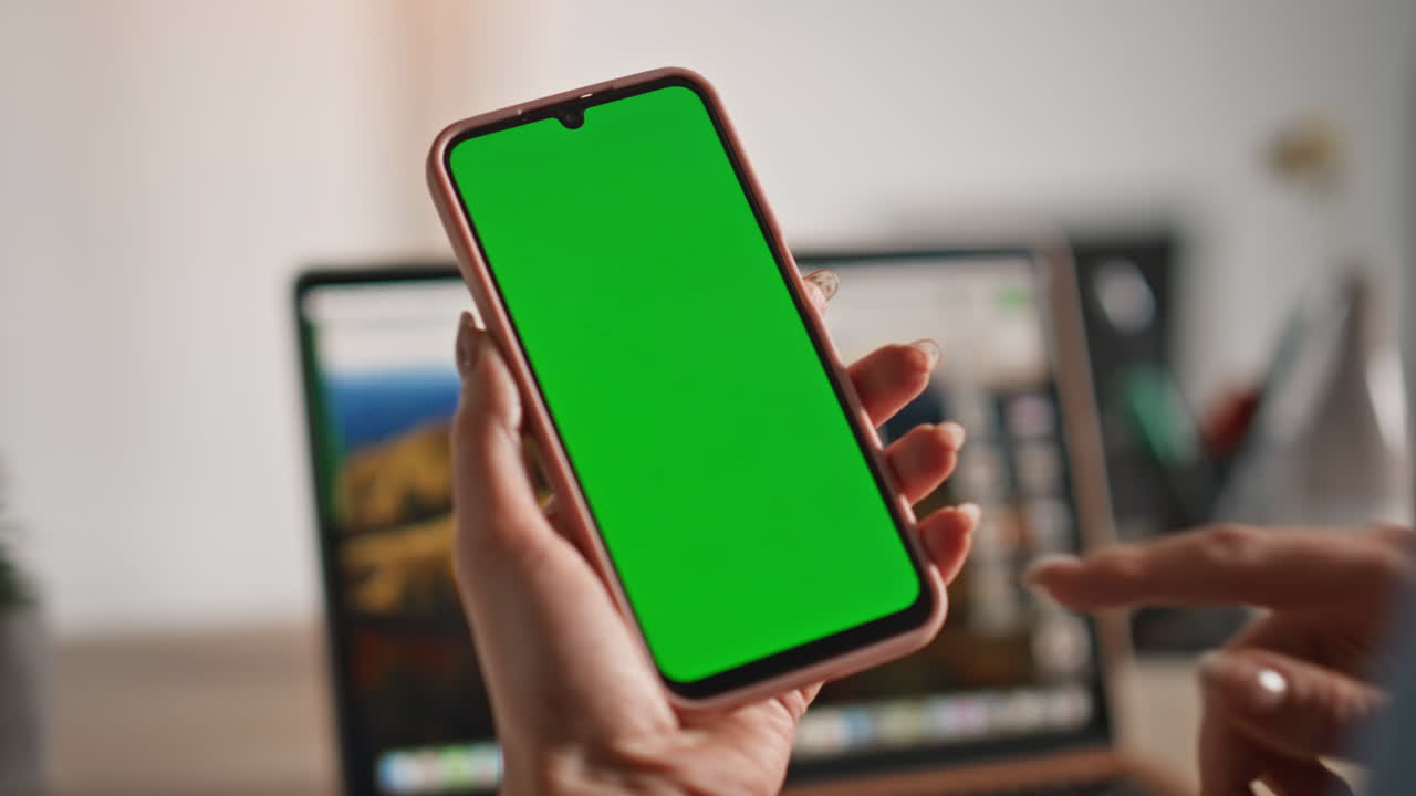 Woman shopping greenscreen cellphone sitting home closeup. Unknown businesswoman