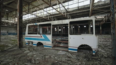 Abandoned Bus in a Derelict Factory