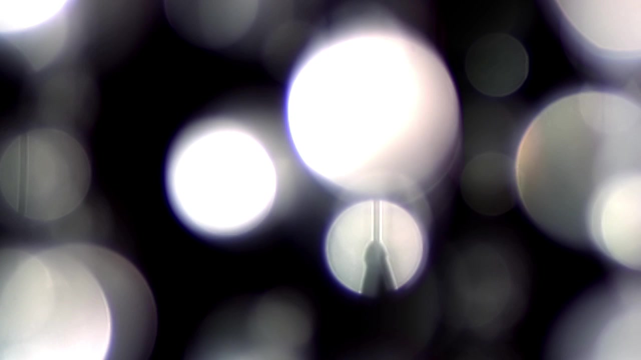 Abstracte Glinsterende Bokeh-lichten met Silhouet