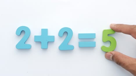 simple addition equation with wooden numbers