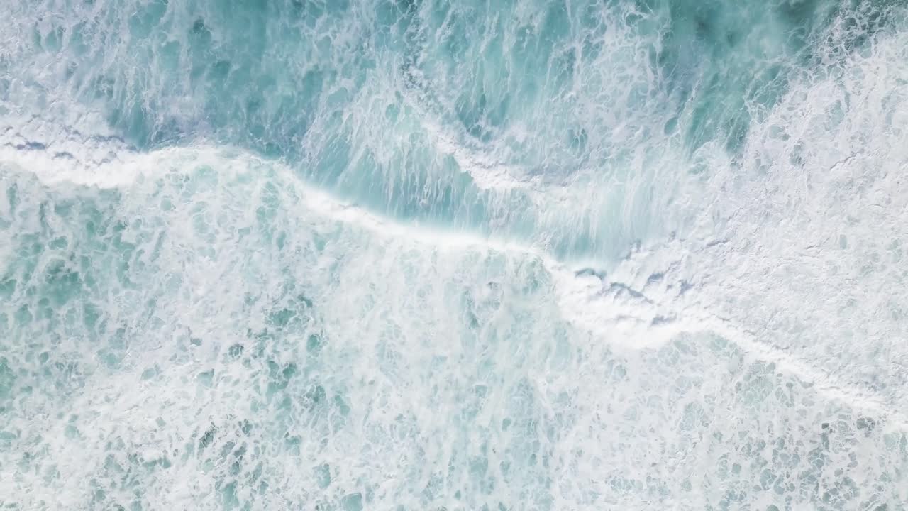 Vibrant waves reach the shores of Maui in Hawaii on the rising tide