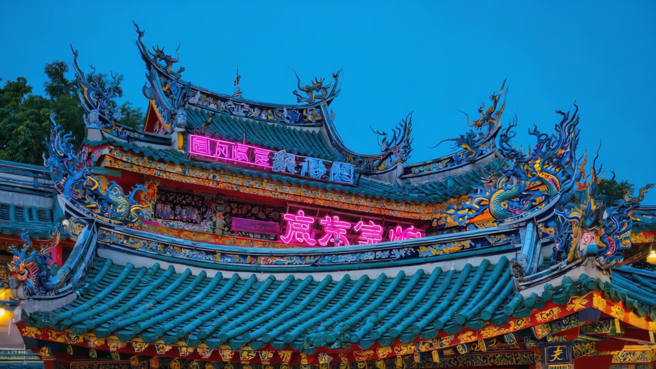 Ornate Traditional Temple Roof with Neon Lights at Dusk