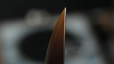 close-up of a sharp knife or blade tip