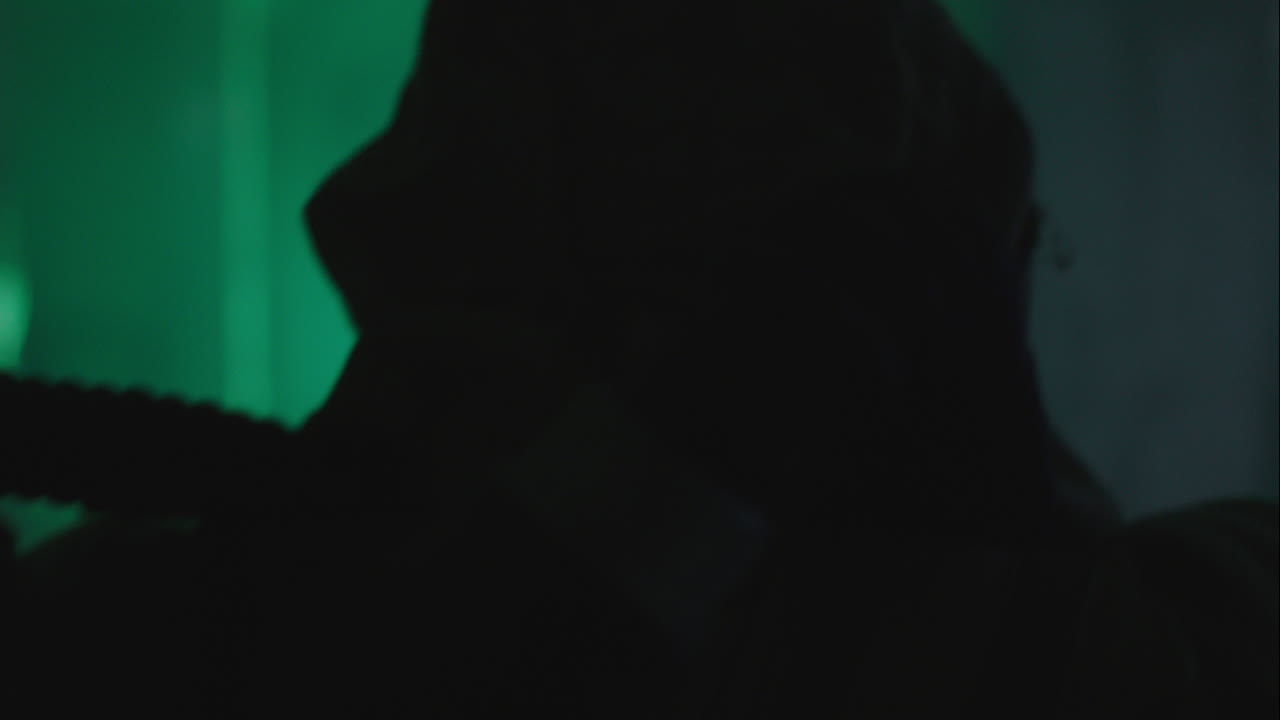 A wounded soldier in the abandoned military complex approaches anomaly