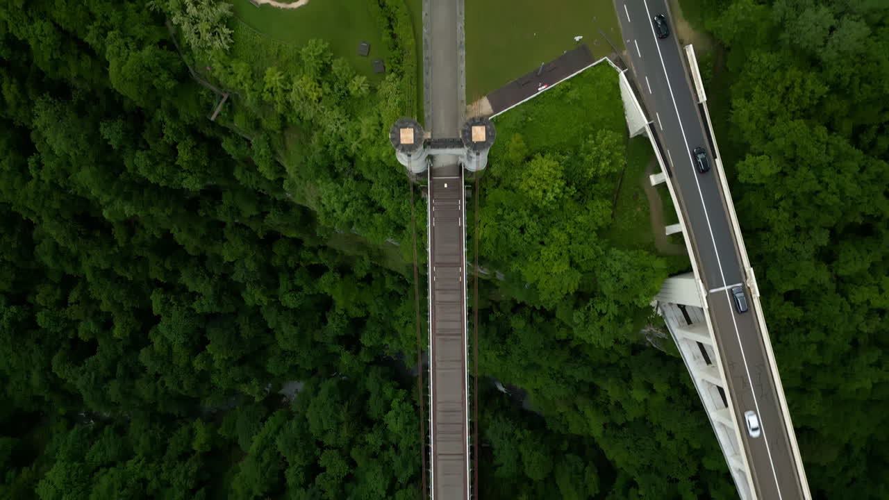 Top down drone shot of Caille Bridge and Caquot Bridge during the day in Allonzier-la-Caille Cruseilles, Haute-Savoie, France