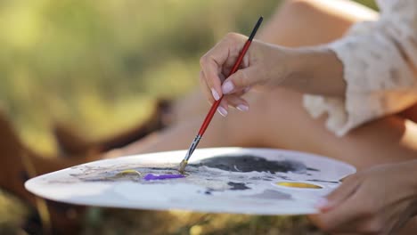 talented african american female artist creating masterpiece painting picture on canvas talented african american female artist creating masterpiece painting picture on canvas in art studio