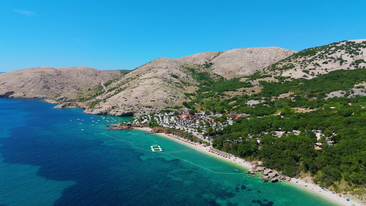 Campsite at Campig Skrila, Krk Island, Stara Baska Croatia, Aerial View of the Mountains and Coast With Boats, Beaches and Adriatic Sea. The Seaside Rv Campmobiles on a Summer Beautiful Coastline