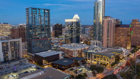 downtown austin during sunset as light turn on cityscape