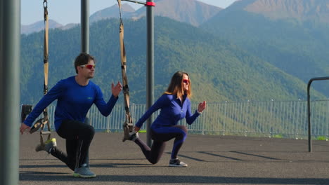 couple outdoors working out