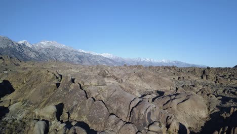 Beautiful-Rocky-Desert-Landscape-by-Eastern-Sierra-Mountain-Range,-California