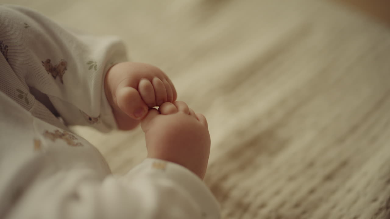 Close-up of Baby Feet on Blanket