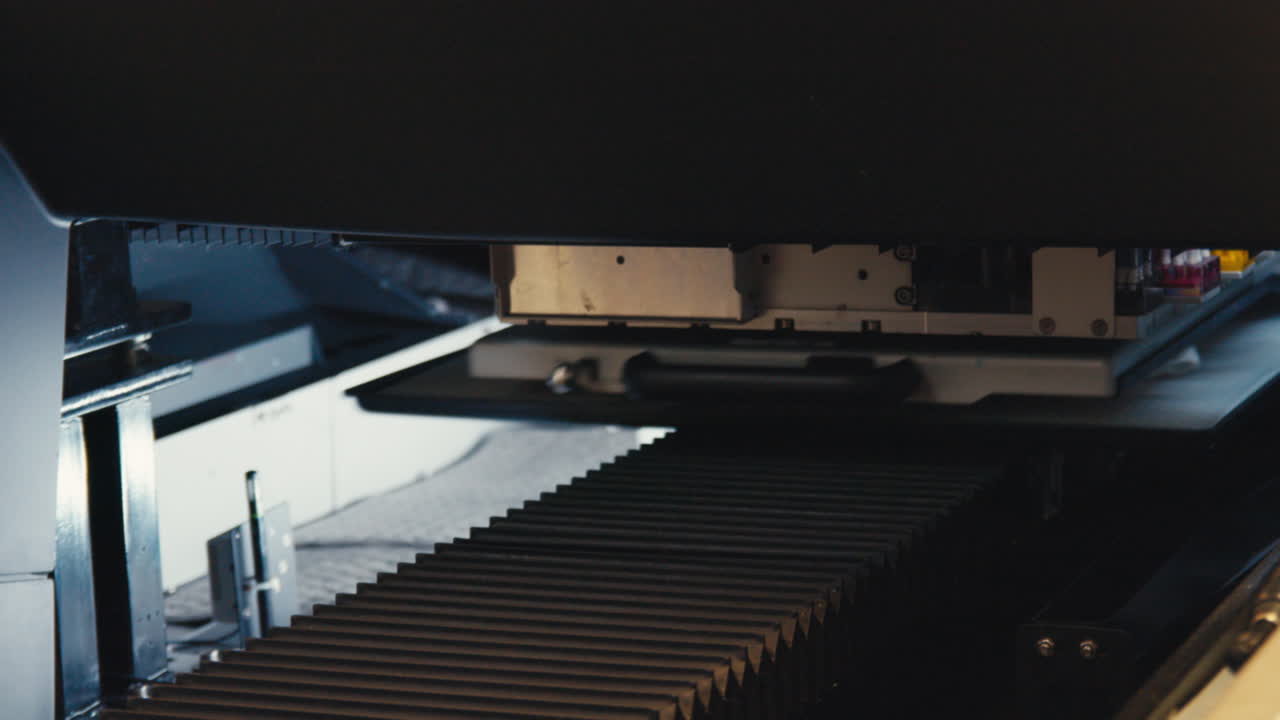 DTG printer prints colorful artwork onto shirt with precision and vivid detail