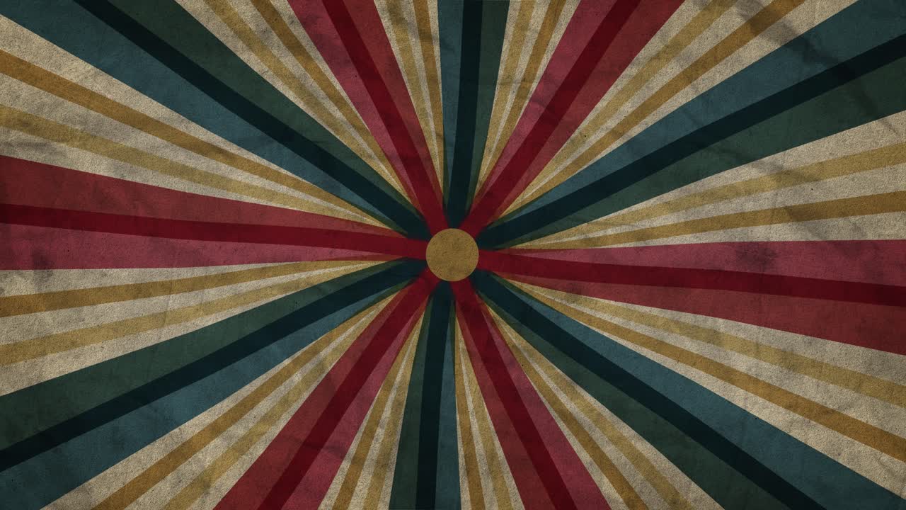 A vintage retro circus background featuring a grunge texture and a dynamic sunburst pattern in muted red, blue, and beige tones. A nostalgic fairground or carnival atmosphere.