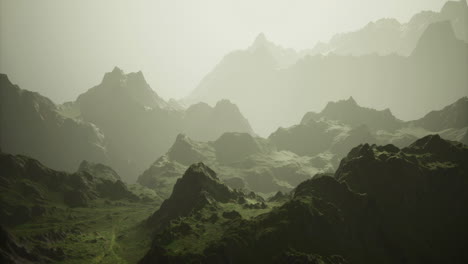 majestic mountain landscape enveloped in mist at dawn