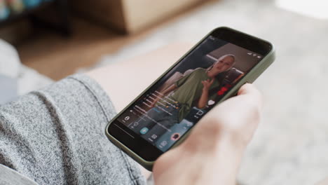 young woman watching a social media video