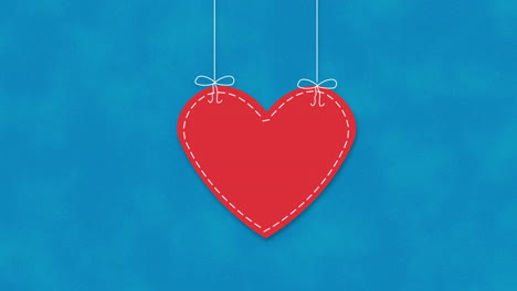 Animierte-Nahaufnahme-Romantisches-Rotes-Herz-Auf-Blauem-Valentinstag-Hintergrund